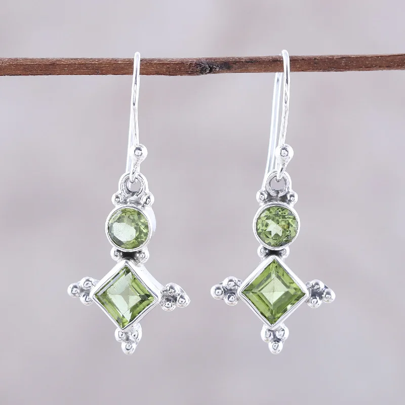 Best hoop earrings with matching bracelets for a coordinated jewelry set-Opulent Stars Sterling Silver and Green Peridot Star Dangle Earrings