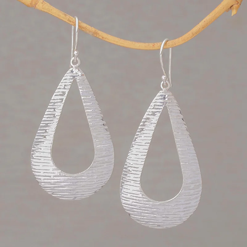 Best hoop earrings with matte finish for a sophisticated, understated design-Silver Gleam Handcrafted Sterling Silver Drop Shaped Dangle Earrings